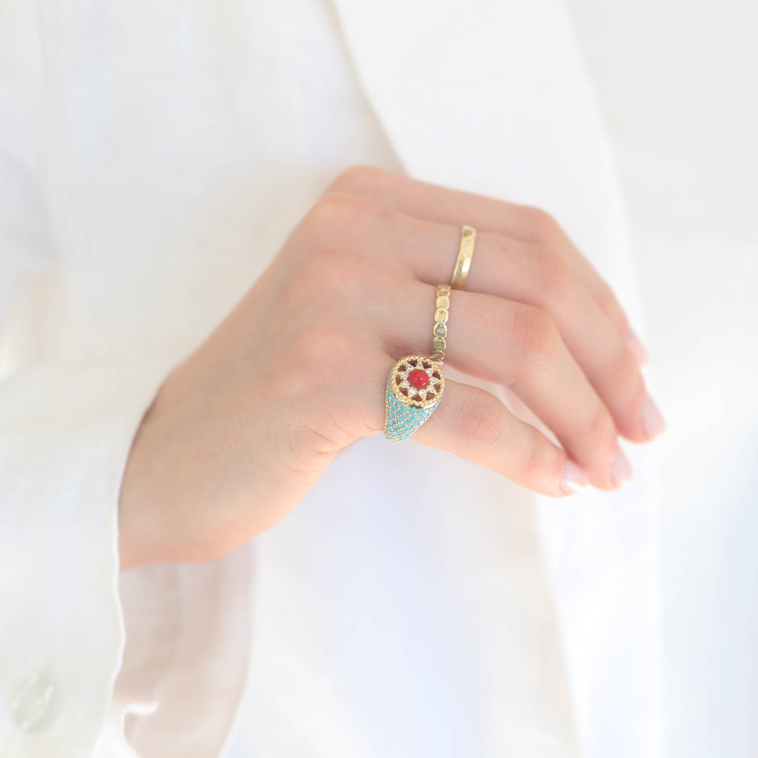 L'atelier Nawbar: Arabesque Pinky Ring, Handmade 18 ct gold, encrusted with 6.05 ct of turquoise stones and 0.15 ct of white diamonds and inlaid with red coral stone. Weight: 6 gr
