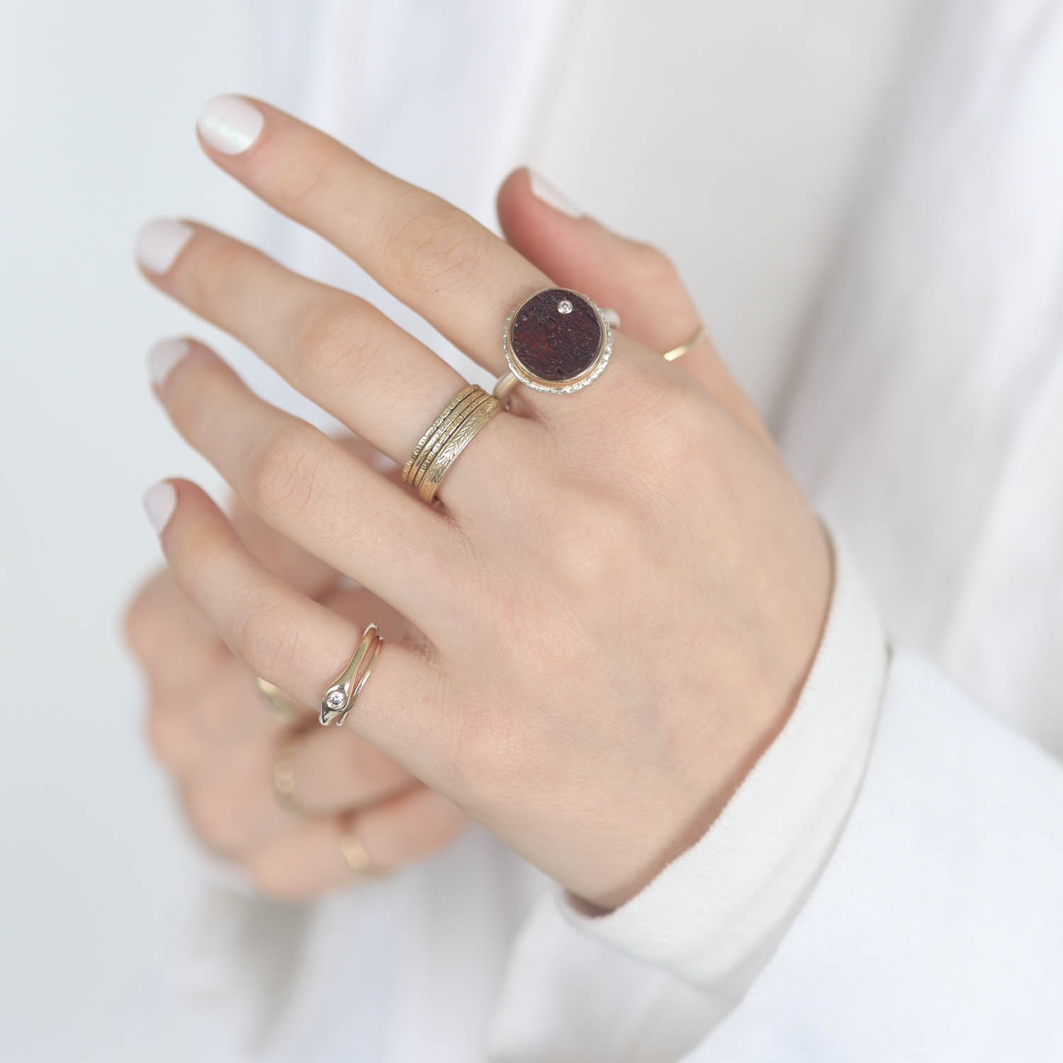 Jamie Joseph: Sterling & 14K Gold Ring w/ Small Round Surface Cut GARNET & .025 ct Diamond on Lava Platform and Egyptian Band, 1/2 dia, 8