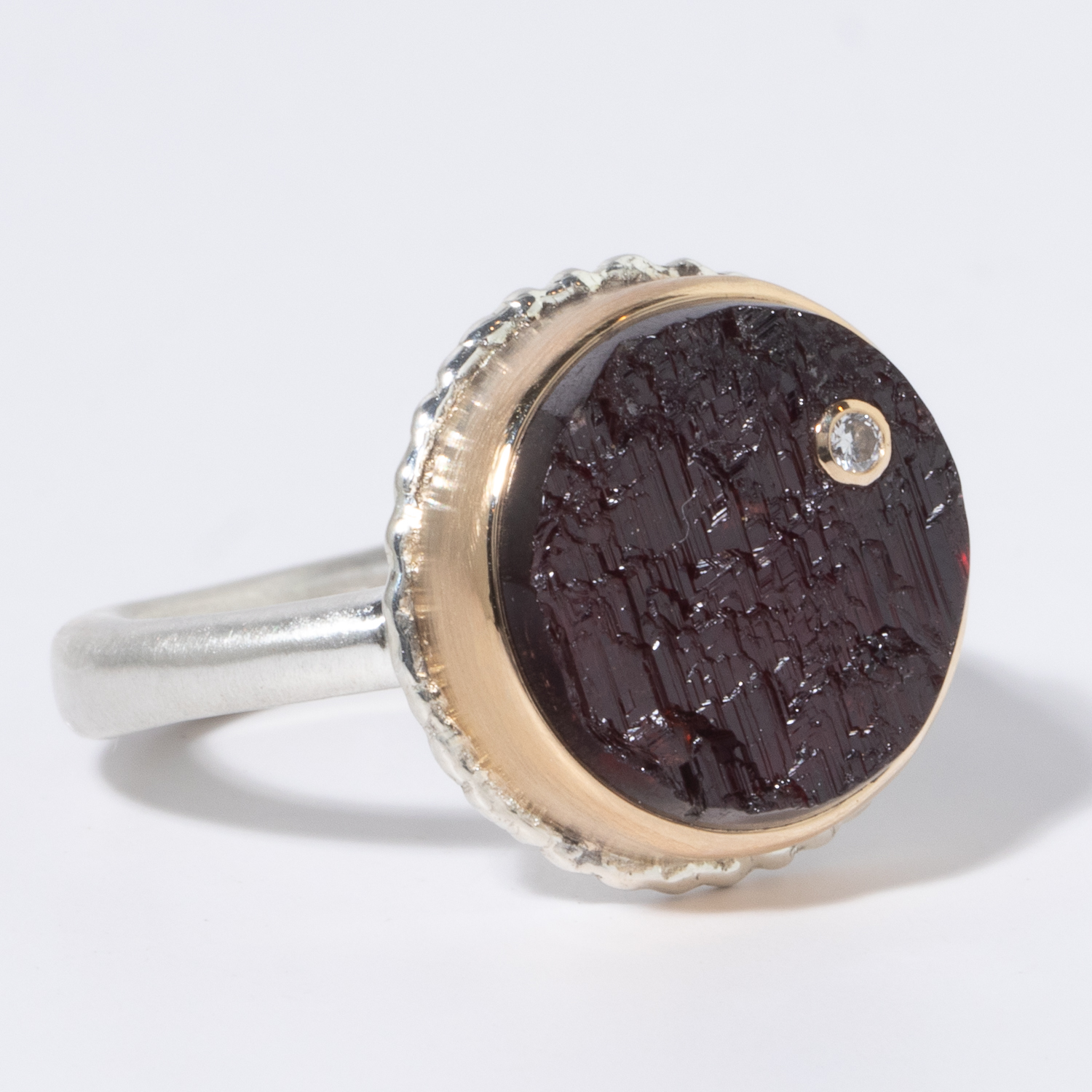 Jamie Joseph: Sterling & 14K Gold Ring w/ Small Round Surface Cut GARNET & .025 ct Diamond on Lava Platform and Egyptian Band, 1/2 dia, 8