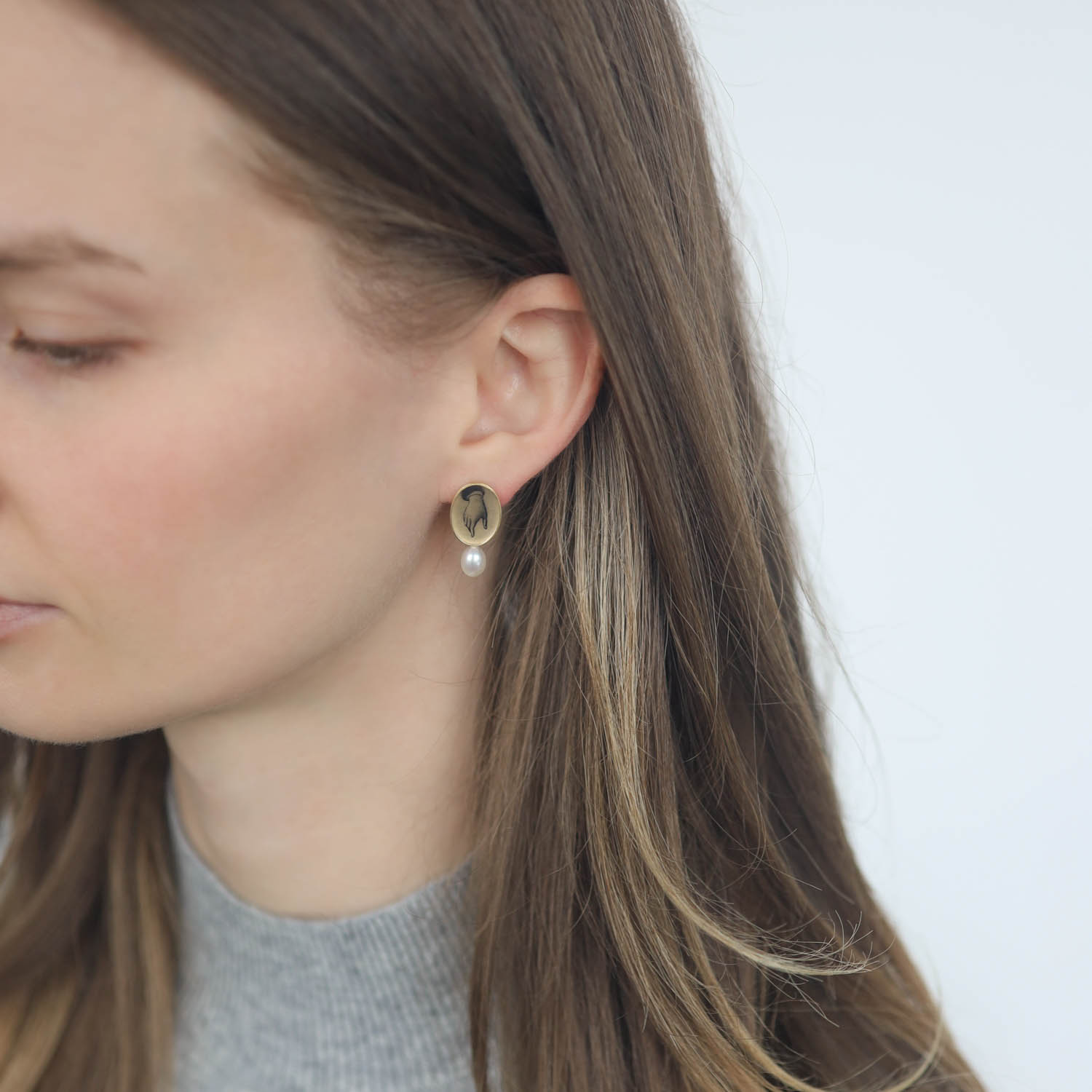 Anzu: Pearl Studs, Gold Vermeil, Oval Setting, Hand Motif, 7/8" x 7/16" at widest point