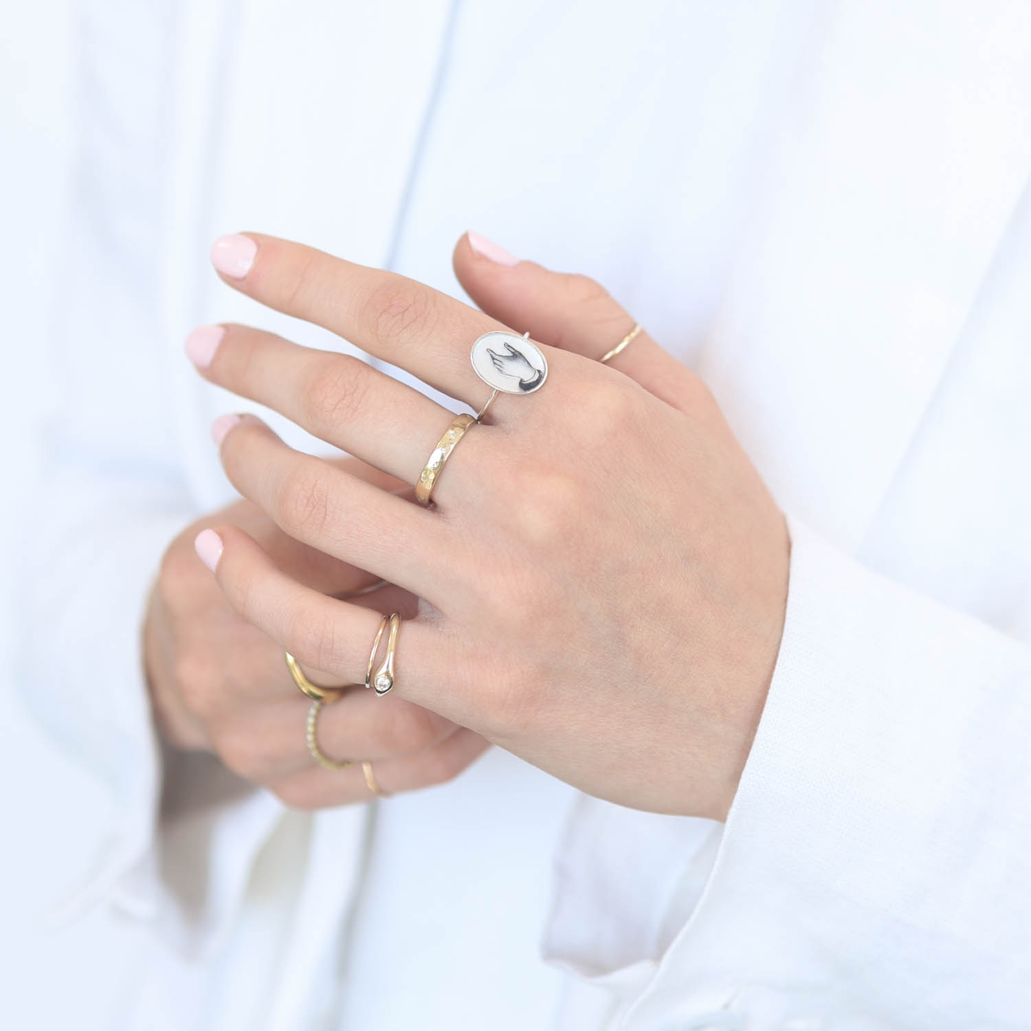 Anzu: Basic Ring- Sterling Silver, Oval Setting: Hand Motif