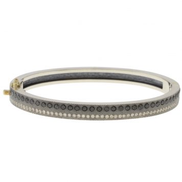 Rene Escobar: ADAM 6MM. SS hinged bangle featuring an 18k YG push button style clasp and set with 0.85CT of BK diamonds.