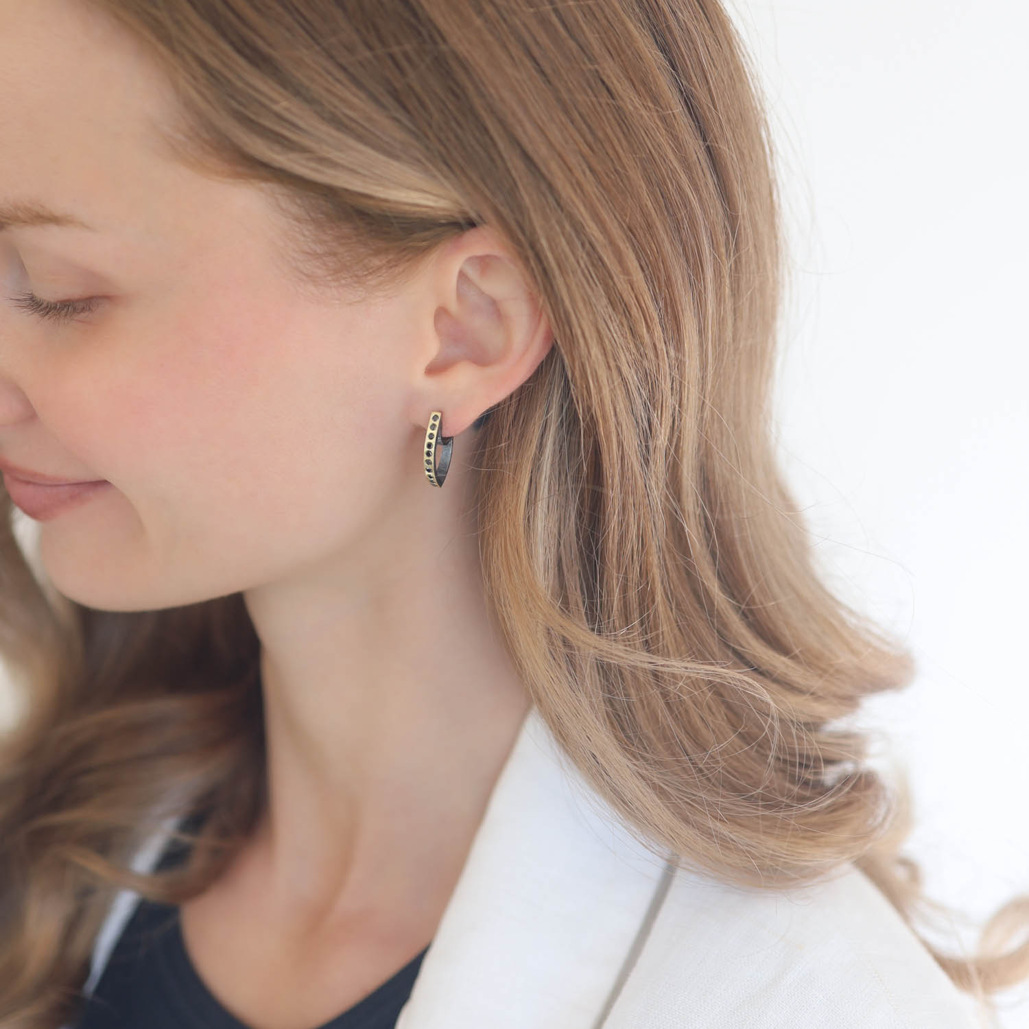 Rene Escobar Trunk Show:SS THIN earrings with 18k YG top sheet set with 0.30CT in BK diamonds and 18k YG post.