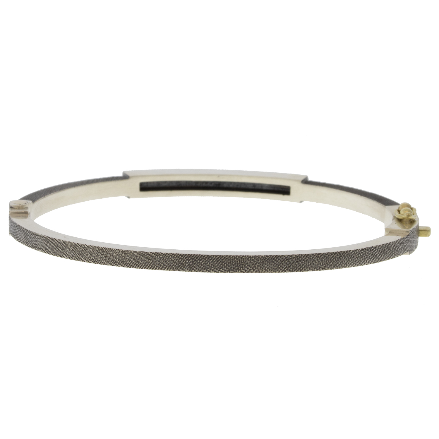 Rene Escobar: 2.5MM. SS hinged bangle featuring an 18k YG push button style clasp set with 0.35CT weight of EME diamonds.