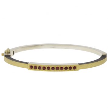 Rene Escobar:DIANA LUX  2.5MM SS hinged bangle featuring an 18k YG push button style clasp and 18k YG top sheet set with 0.40CT RUBY