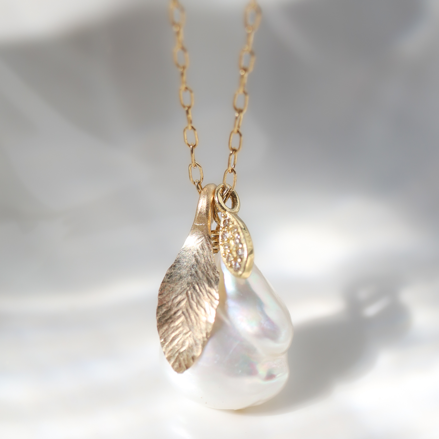 Dana Kellin Fine: Necklace, Pearl w/ gold leaf charm & pave charm, 14k & diamonds