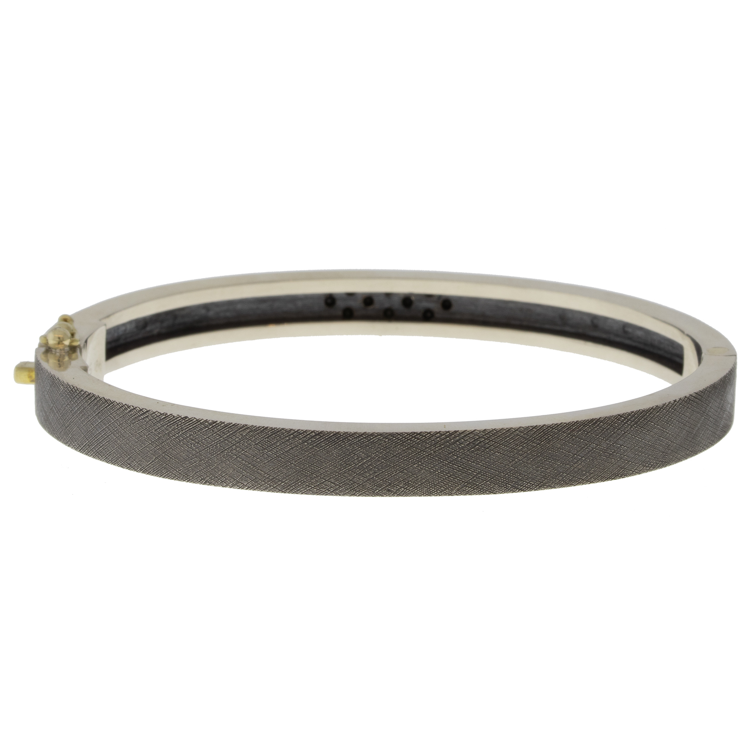 Rene Escobar Trunk Show:20 6MM. SS hinged bangle featuring an 18k YG push button style clasp set with 0.85CT with BK and WH diamonds.
