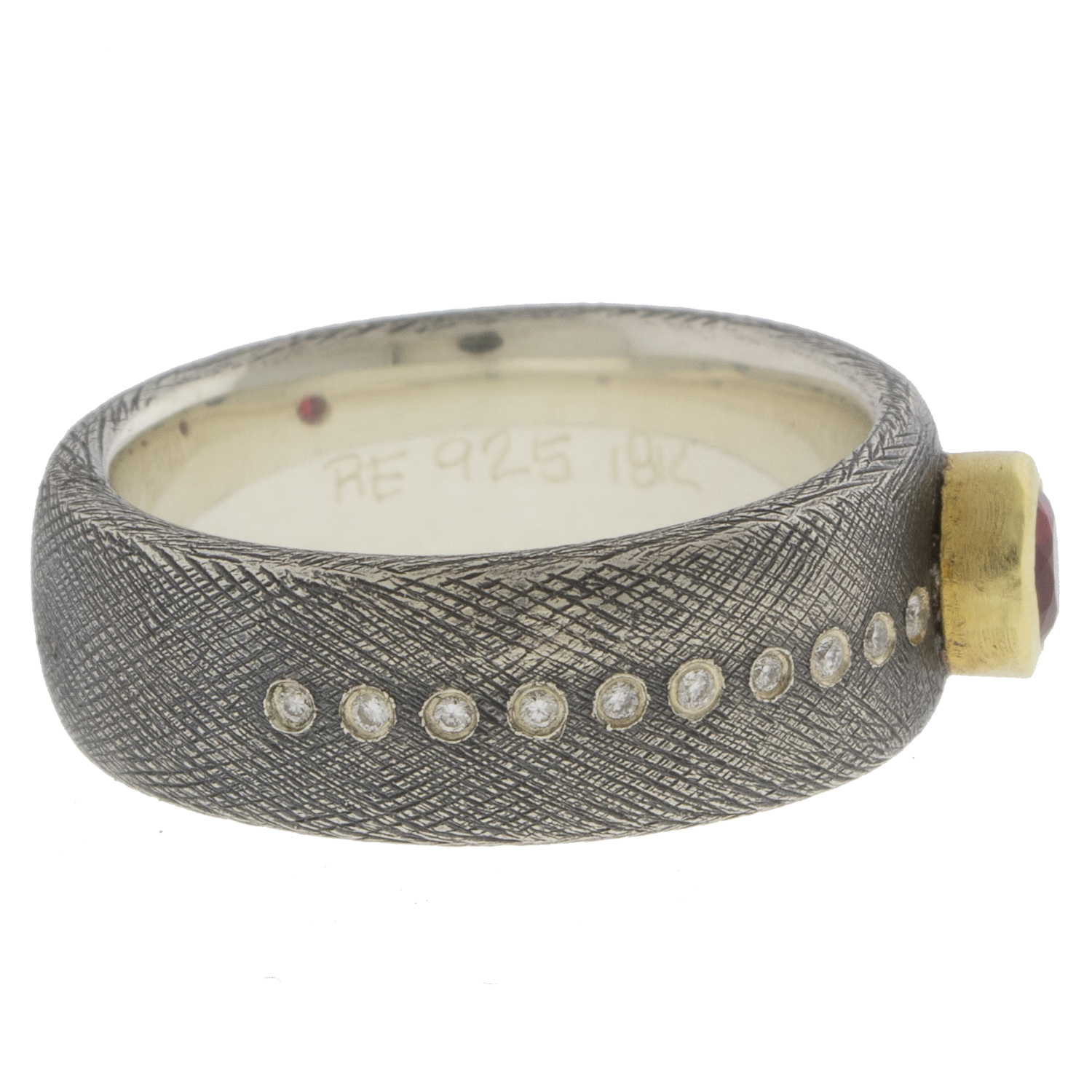 Rene Escobar Trunk Show:8MM. SS ring set with 0.10CT of WH diamonds and 18k YG bezels set with 0.40CT of RU.