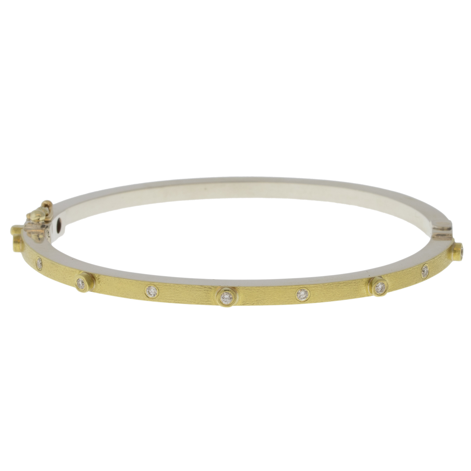 Rene Escobar Trunk Show:26 0.20CT 2.5MM. SS hinged bangle featuring an 18k YG push button style clasp and 18k YG top sheet and bezels set with 0.20CT in WH diamonds.
