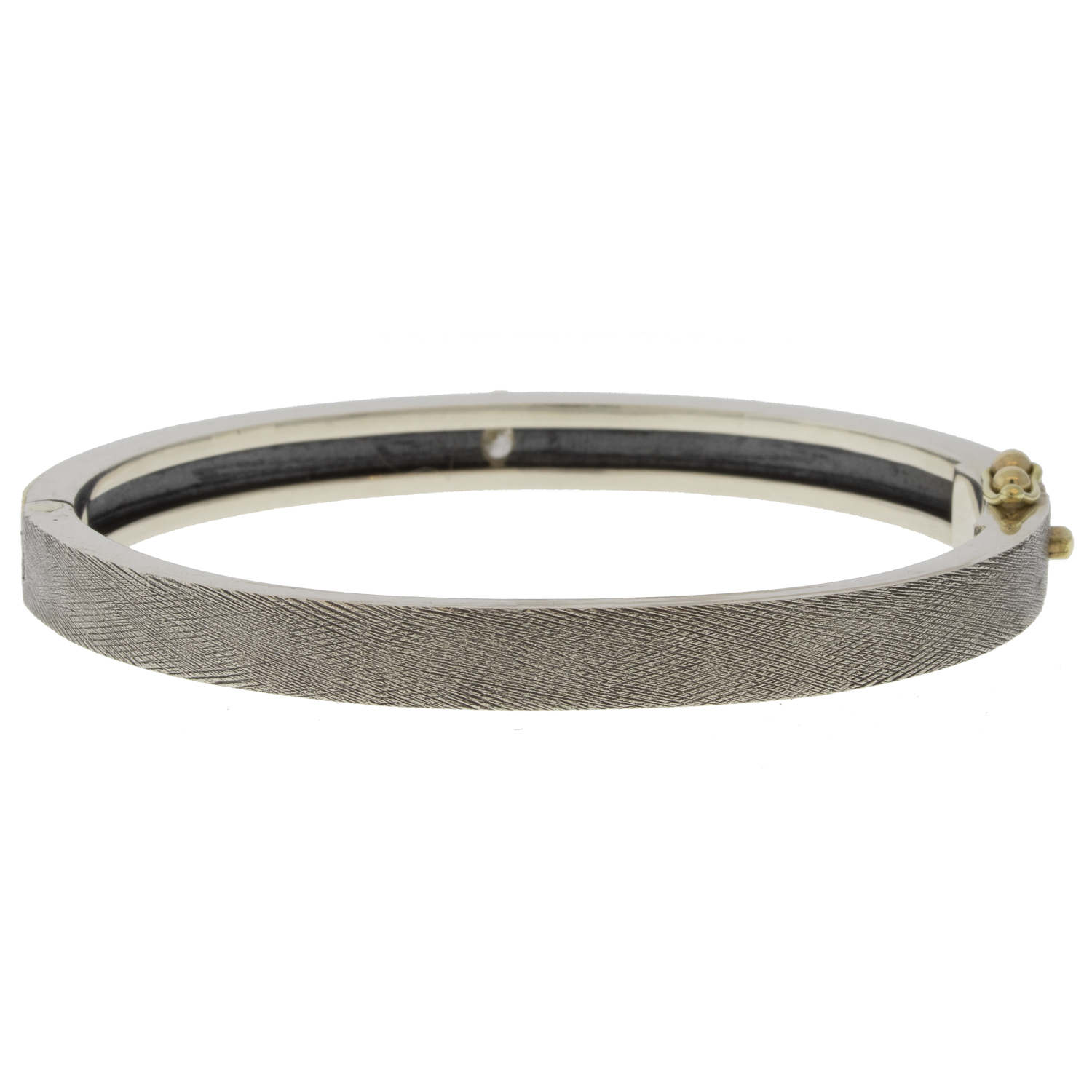 Rene Escobar Trunk Show:37 6MM. SS hinged bangle featuring an 18k YG push button style clasp and a solid 18k YG top sheet and bezel set with OV cut with 0.45CT of WH diamonds.
