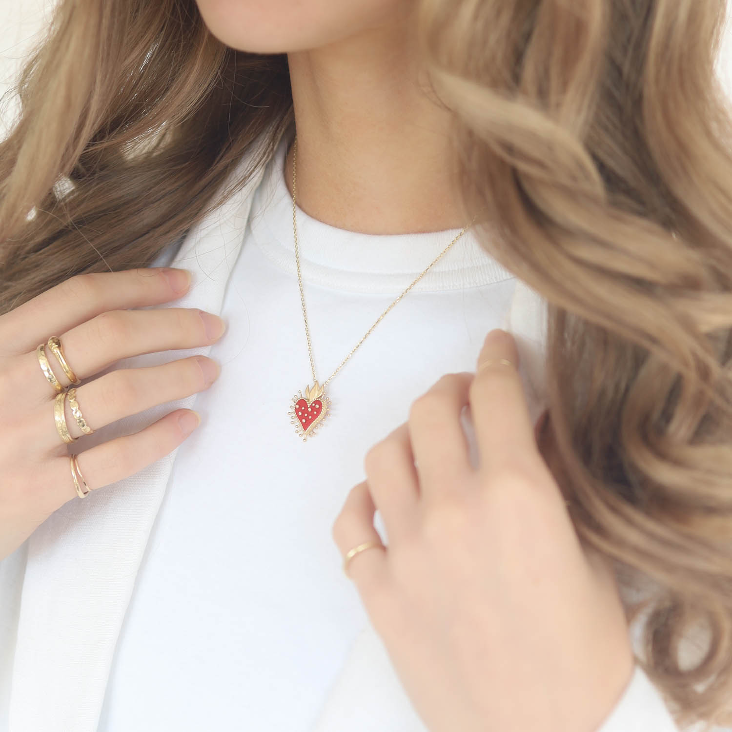 L'atelier Nawbar:Flame Heart necklace,RED Handmade 18K gold necklace inlaid with red coral stone and encrusted with 0.03 ct of round white diamonds. Weight : 4.35 gr.