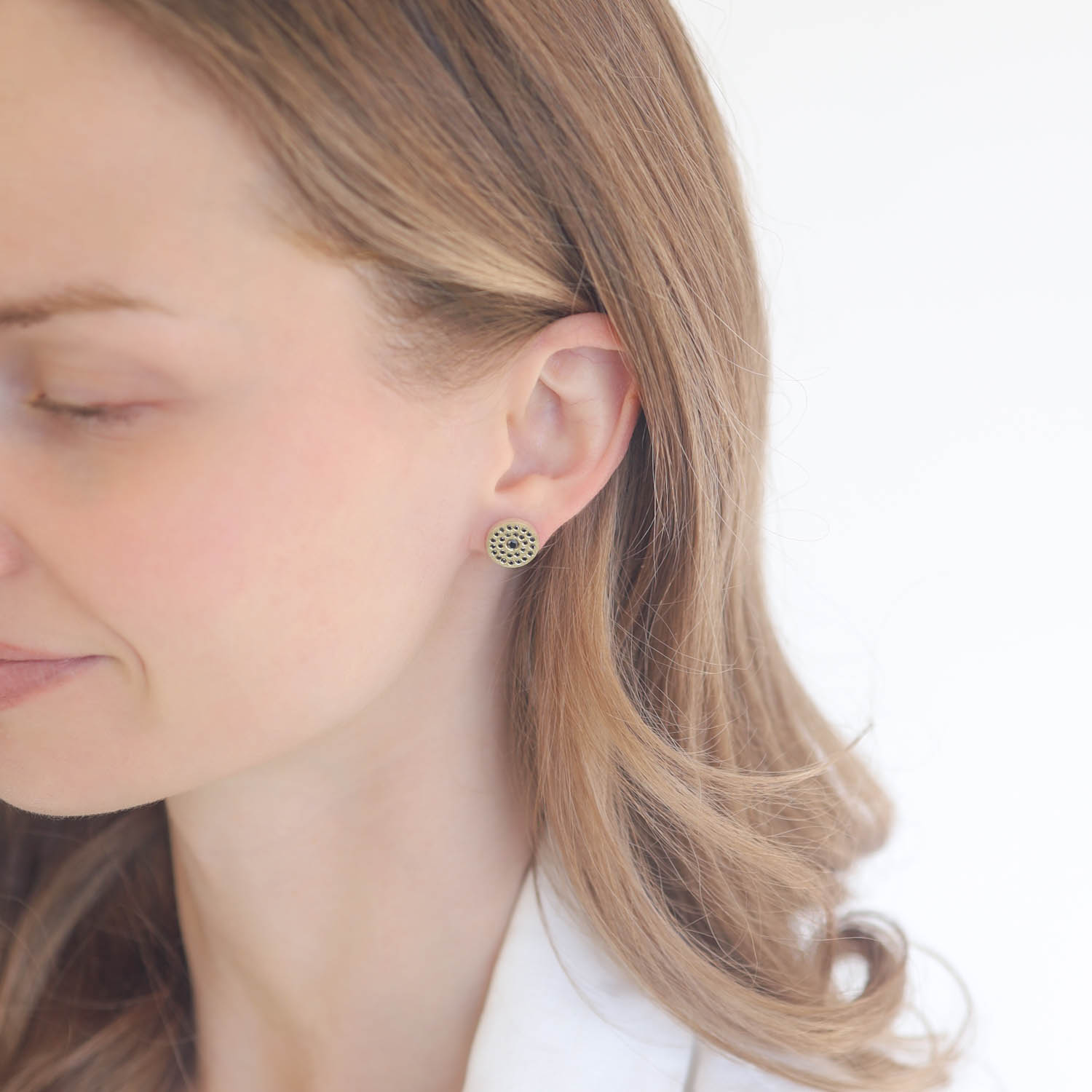 Rene Escobar Trunk Show:SS stud earrings with 18k YG top sheet set with 0.40CT in BK diamonds and 18k YG post.