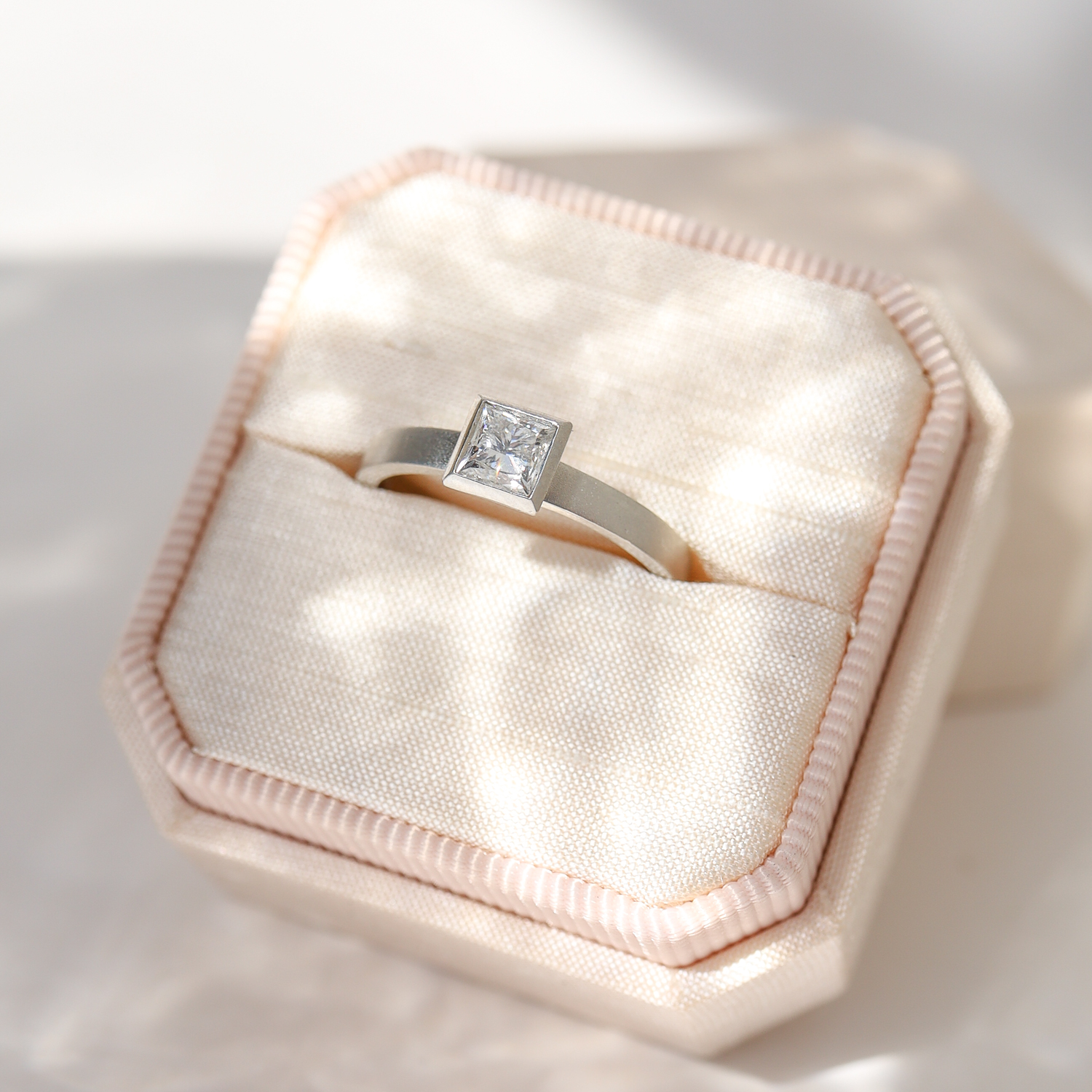 Jamie Joseph: Platinum Ring w/ Bezelled .58 ct F VS1 Princess Cut Diamond Solitaire