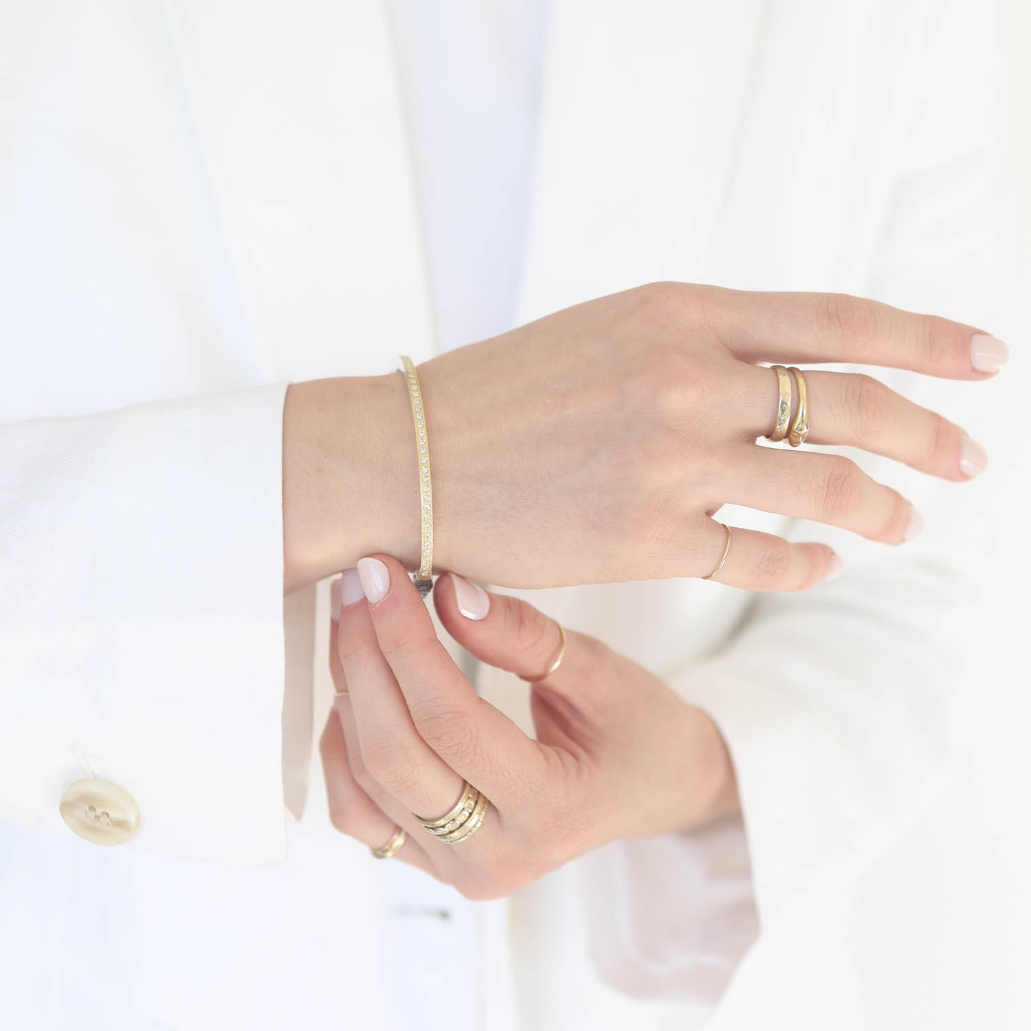 Rene Escobar Trunk Show: 14 2.5MM BANGLE WITH GOLD FRONT AND SILVER BACK SET WITH 0.70CT IN WHITE DIAMONDS ALL THE WAY AROUND